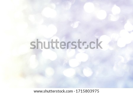 White and grey light leaves blurred and blur natural abstract. Effect sunlight  soft bright shiny style  bokeh circle yellow and orange blurry morning . For wallpaper backdrop and background.

