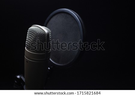 Valve microphone with pop filter recording studio