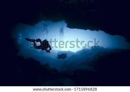 cenote angelita, mexico, cave diving, extreme adventure underwater, landscape under water fog Royalty-Free Stock Photo #1715896828