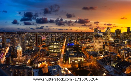 Vancouver, British Columbia, Canada. Aerial Panoramic View of Modern Downtown City during Twilight. Dramatic Colorful Sunset Sky Composite.