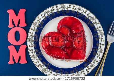 Heart shaped homemade strawberry pretzel salad for Mothers Day. Greeting card consept.