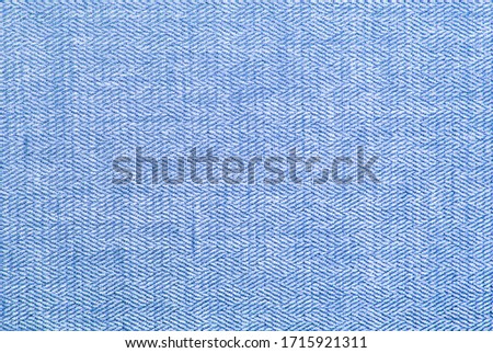 Background from natural gray linen fabric with a pronounced texture