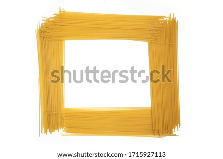 Frame of long pasta on a white background.