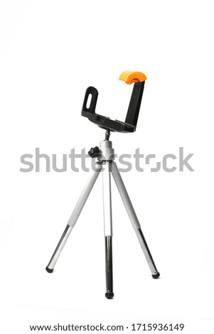 mobile phone stand, octopus tripod in white background isolation