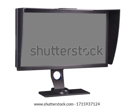Professional photographer monitor with shading hood isolated on white background with empty screen and clipping path