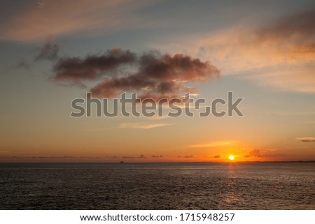 Sunset at the beach Farol da Barra in Salvador/ Bahia