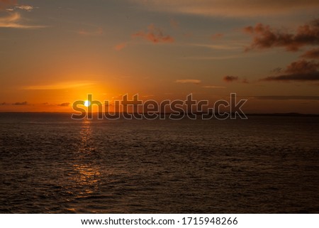 Sunset at the beach Farol da Barra in Salvador/ Bahia