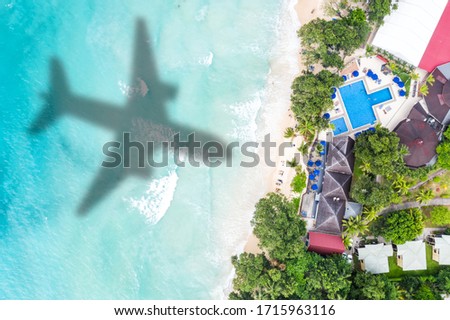 Symbolic picture vacation travel traveling luxury villa sea airplane flying Seychelles aerial photo beach waves