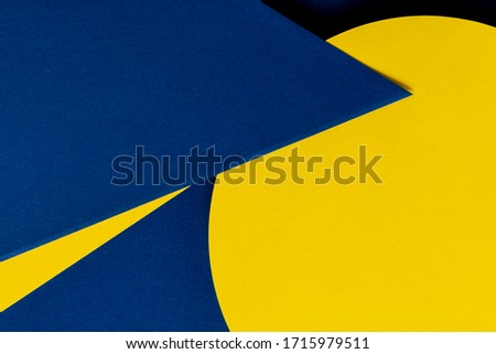Abstract colored paper texture background. Minimal geometric shapes and lines in navy blue and yellow colors