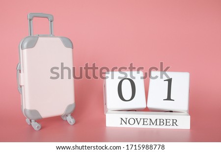 Calendar wooden cube. November 01, time for a autumn holiday or travel, vacation calendar