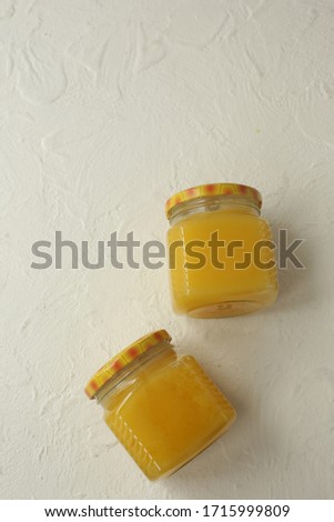 Honeycombs and jar of honey
