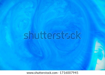 Closeup abstract color mixing of acrylic for use as background. Acrylic texture with marble pattern, marbling background 