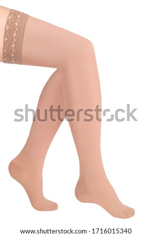 Beige stockings. Compression Hosiery. Medical stockings, tights, socks, calves and sleeves for varicose veins and venouse therapy. Clinical knits. Sock for sports isolated on white background