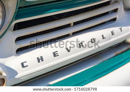 Vintage Chevrolet Front Grill on White. Royalty-Free Stock Photo #1716028798