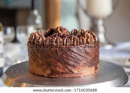 Beautifully decorated chocolate cake with Black Forest center. Tasty, culinary, fine, dining, yum. 