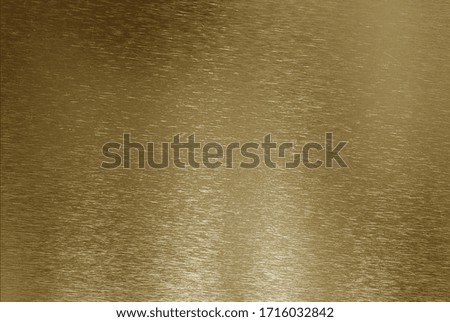 Metallic golden gradient background with thin scratches