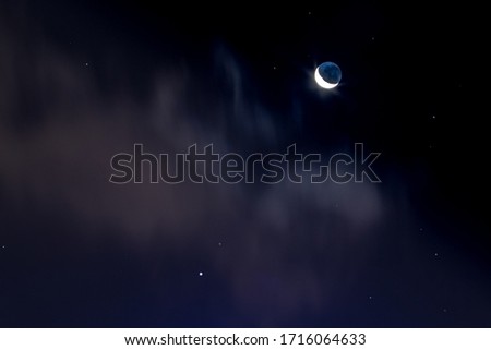 Crescent moon photographed next to Venus in south hemisphere