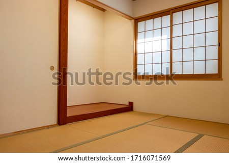 Washitsu, traditional Japanese room with tatami mat and alcove Royalty-Free Stock Photo #1716071569