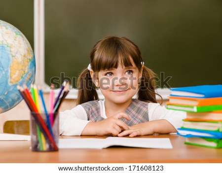 Portrait of lovely girl in classroom Royalty-Free Stock Photo #171608123