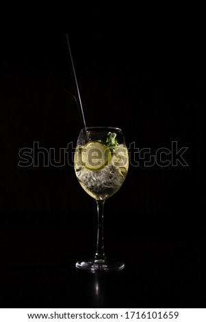refreshing cocktail on a neutral black background
