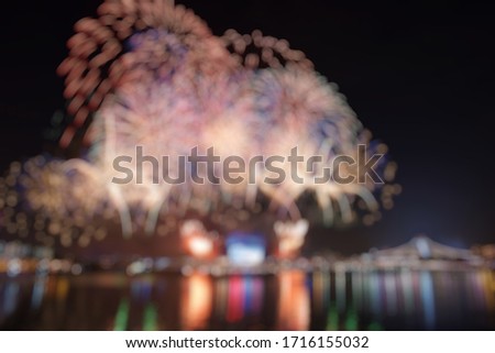 Blur background of beautiful Singapore national day fireworks at national stadium.
