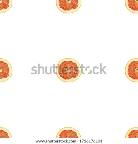 Seamless pattern of isolated slices of grapefruit. Wallpaper for background, design and packaging.
