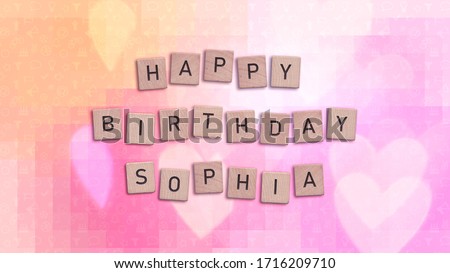 Happy Birthday Sophia card with wooden tiles text. Girls birthday card in rainbow colors. This image can be used for a eCard or a print postcard.