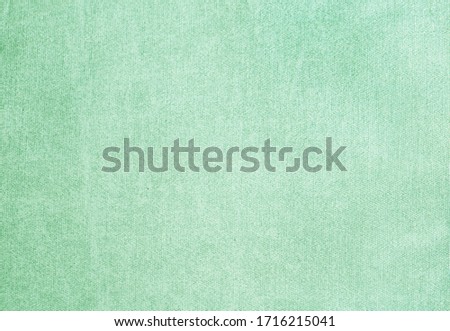 Texture of delicate fabric as background. Image toned in mint color  Royalty-Free Stock Photo #1716215041
