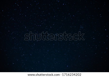 Blue night starry sky, space, background for screensaver. Astrology, horoscope, zodiac signs Royalty-Free Stock Photo #1716234202