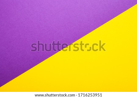 Purple and yellow paper as background. Two colored bright paper texture, top view with place for text Royalty-Free Stock Photo #1716253951