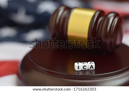 Justice mallet and ICA acronym. Congressional budget and impoundment control act Royalty-Free Stock Photo #1716262303