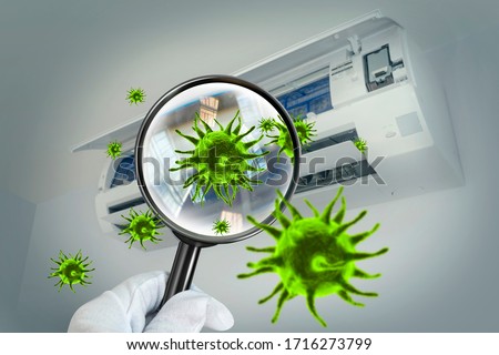 3D simulation of viruses inside the air conditioner by showing through a magnifying glass Royalty-Free Stock Photo #1716273799