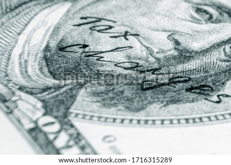 Close up US Dollar banknote with inscription Tax Reform 