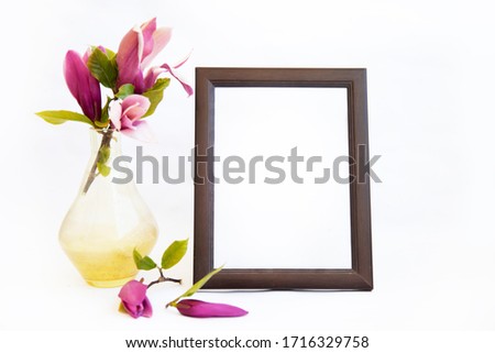 Frame for a portrait with magnolia branches in a jug. A frame that covers your quote, promotion, headline or design is great for small businesses, bloggers.