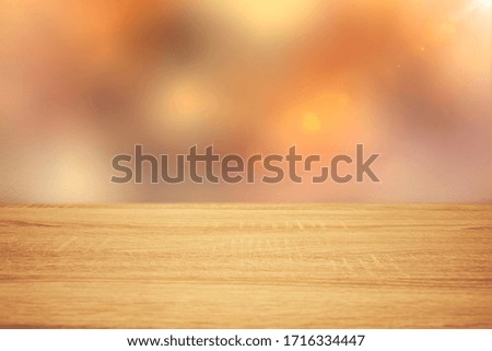 Natural wooden table with blurred background