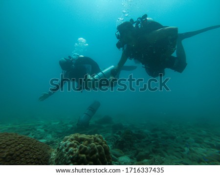 Professional diving partners in Thailand Royalty-Free Stock Photo #1716337435