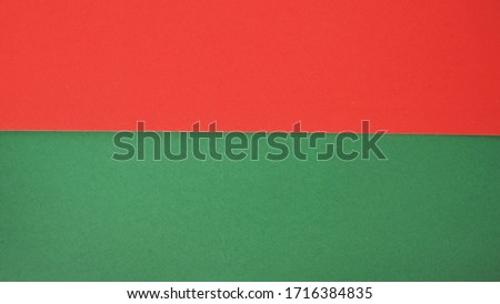  Green and red color paper for background.it is empty space and no people.