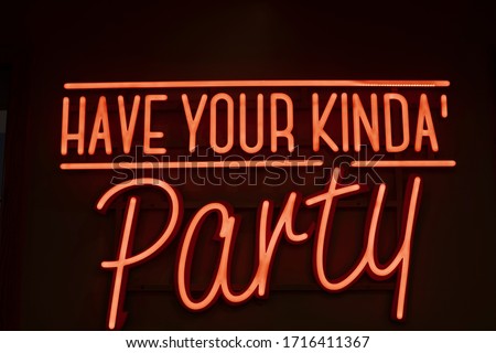 Party Neon Sign. Slogan "Have your kinda party". Fun sign for celebration, nightclub, festivals. Illuminated sign.