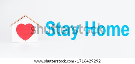 Stay home concept house and heart on gray background sign safe coronavirus covid-19 