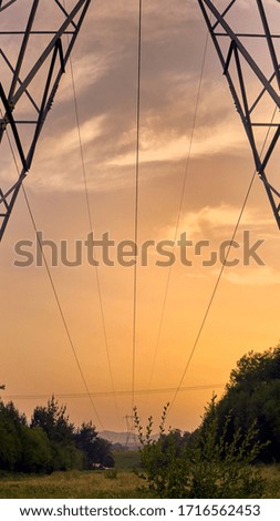                    Sunset from electric poles in nature            