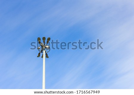 lighting mast lantern construction on blue sky background