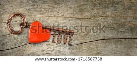 Image of a stylized heart and key as a symbol of love and fidelity. Grunge style image