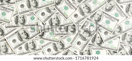 Top view of American money background. Pile of dollar cash. Paper banknotes concept.