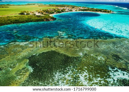 Aerial photography of the East coast of the island of Mauritius. Beautiful lagoon of the island of Mauritius, taken from above.Indian ocean coral reef