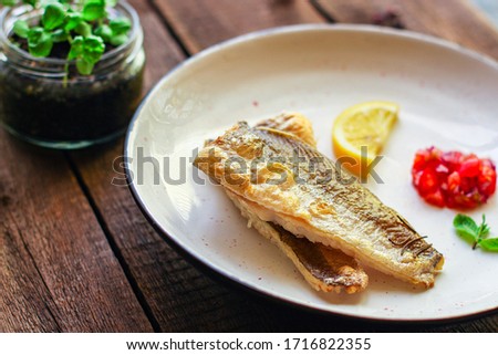 Fried fish fillet hake, seafood main course pescatarian
Menu concept. food background. top view copy space for text keto or paleo diet
