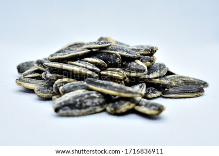 Sunflower seeds on white background