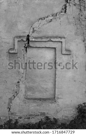 Black and white photo of frame on concrete wall for background