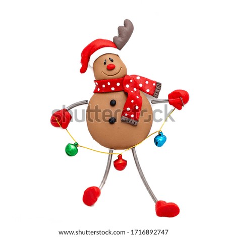 funny christmas decoration  of brown snowman with santa hat and reindeer horn on white background