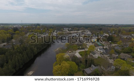 Park along the river from a drone