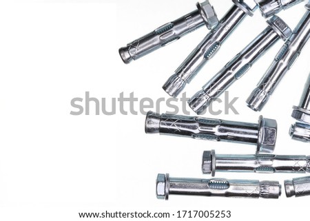 Anchor bolts for fixing in concrete on a white background. With place for text.